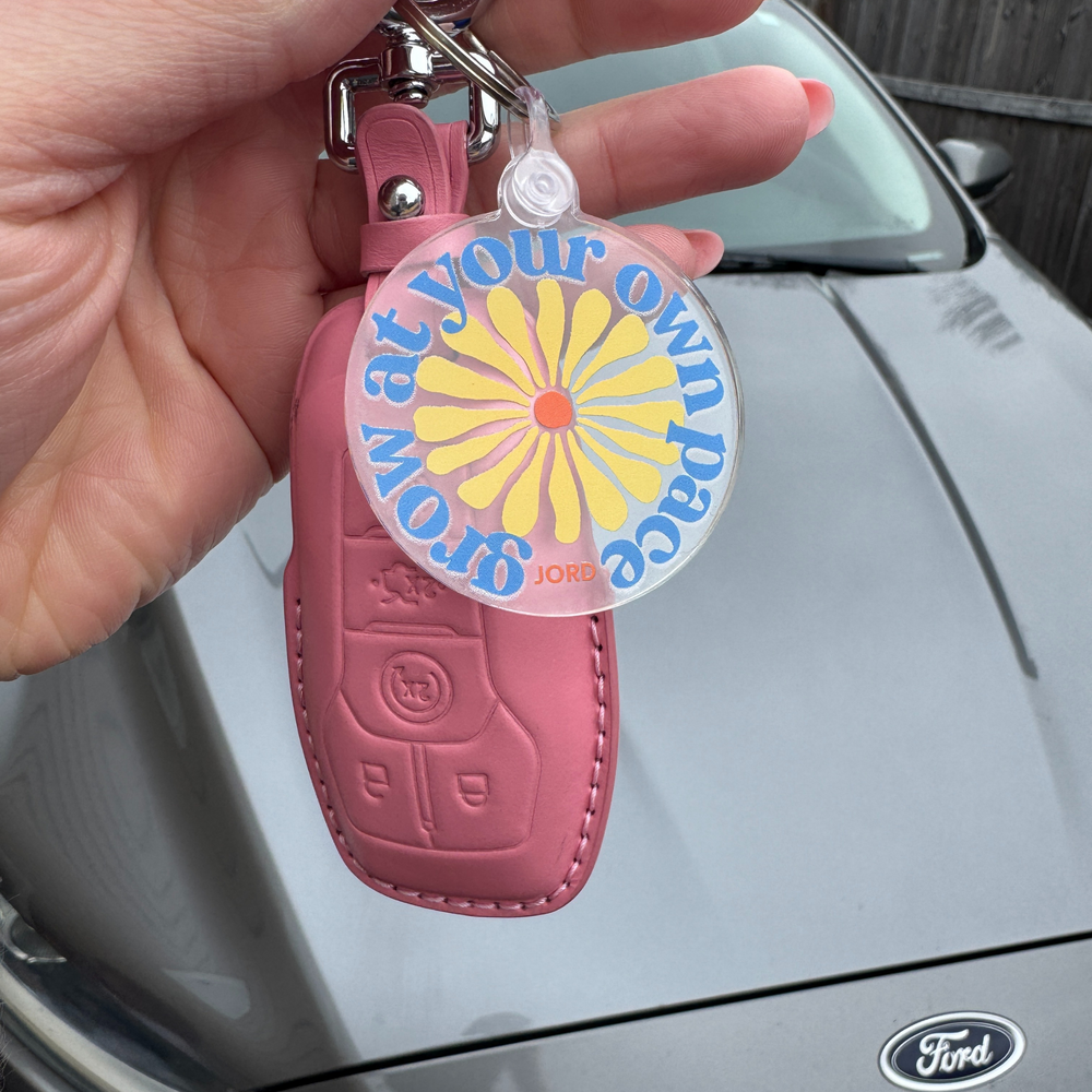 Grow at Your Own Pace Keychain – Empowering & Stylish Reminder